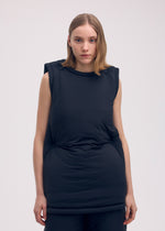 A model wears the ISSEY MIYAKE PUMPED T tunic.
