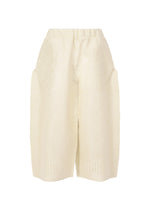 A product shot of the ISSEY MIYAKE PANINI trousers in white (01).