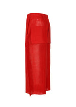 A detail shot of the ISSEY MIYAKE PANINI trousers.