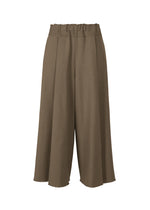 A product shot of the ISSEY MIYAKE CAMPAGNE trousers in khaki (65).