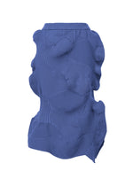 A product shot of the ISSEY MIYAKE KONE KONE skirt in blue (72).