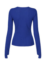 A detail shot of the ISSEY MIYAKE BODY KNIT top.