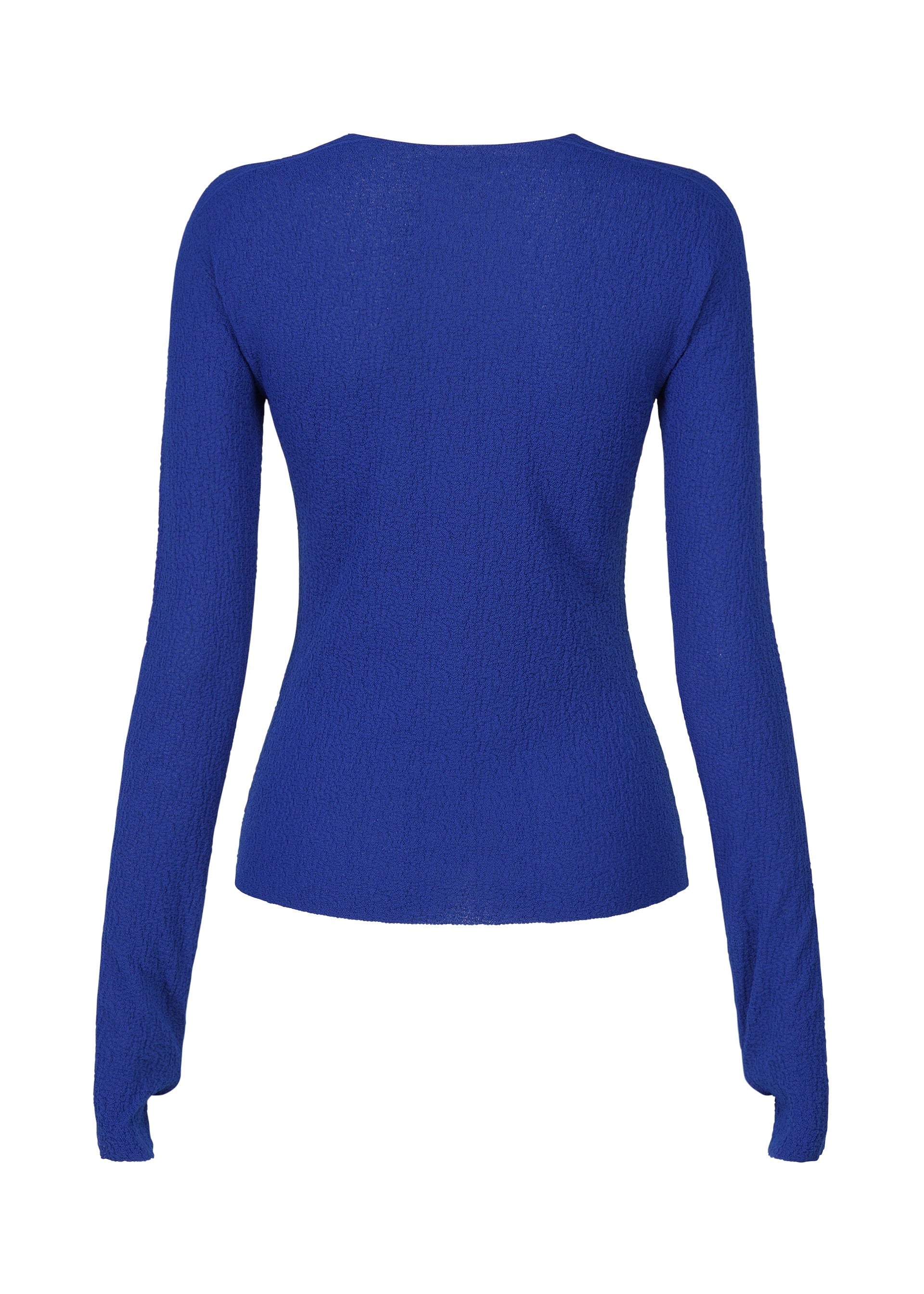 A detail shot of the ISSEY MIYAKE BODY KNIT top.