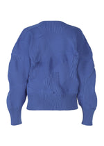 A detail shot of the ISSEY MIYAKE KONE KONE top.