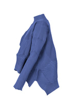 A detail shot of the ISSEY MIYAKE KONE KONE top.