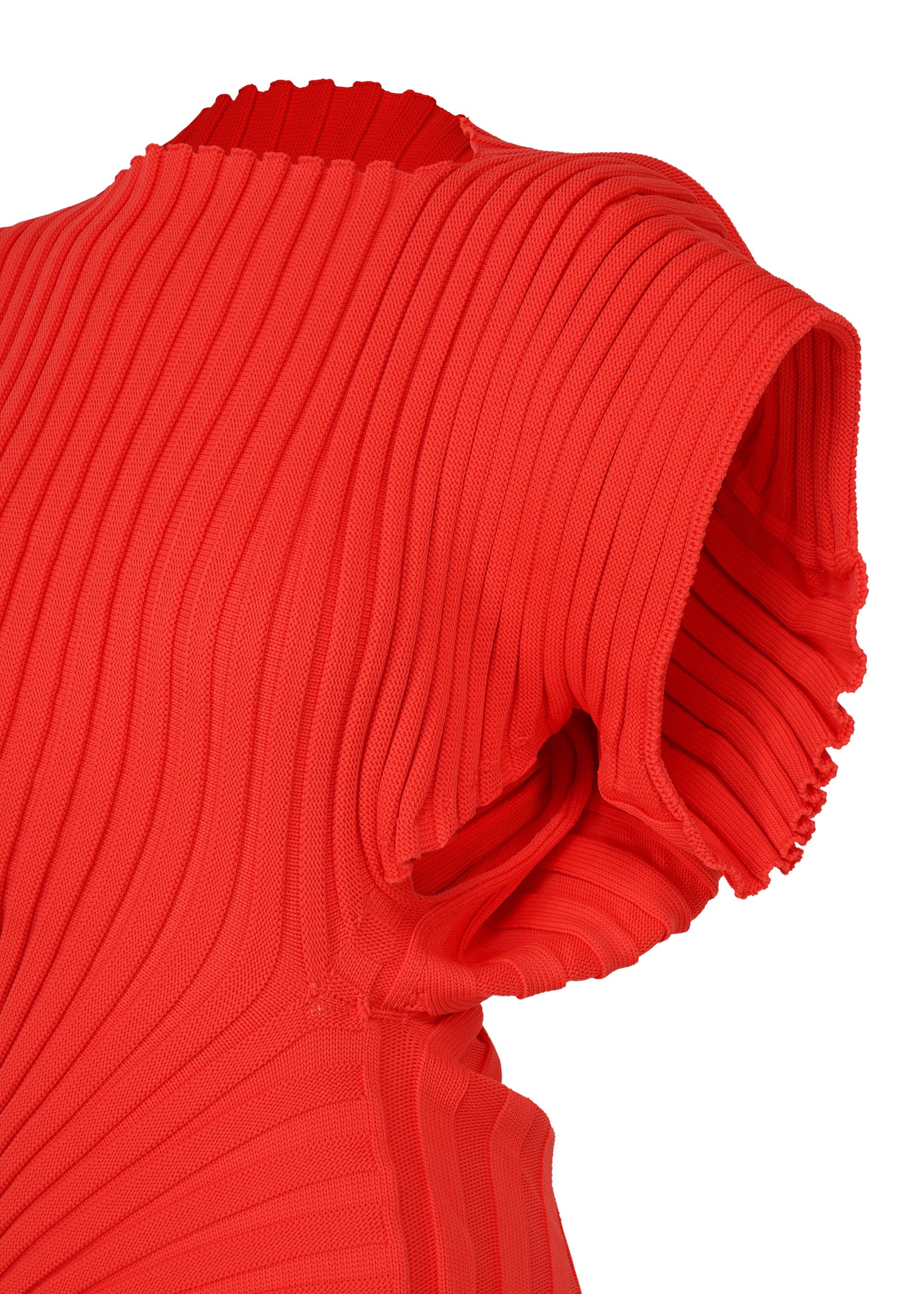 A detail shot of the ISSEY MIYAKE KNIT (AS IT IS) top.