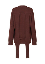 A detail shot of the ISSEY MIYAKE BACKPACK KNIT top.