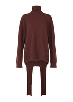 A product shot of the ISSEY MIYAKE BACKPACK KNIT top in dark brown (45).