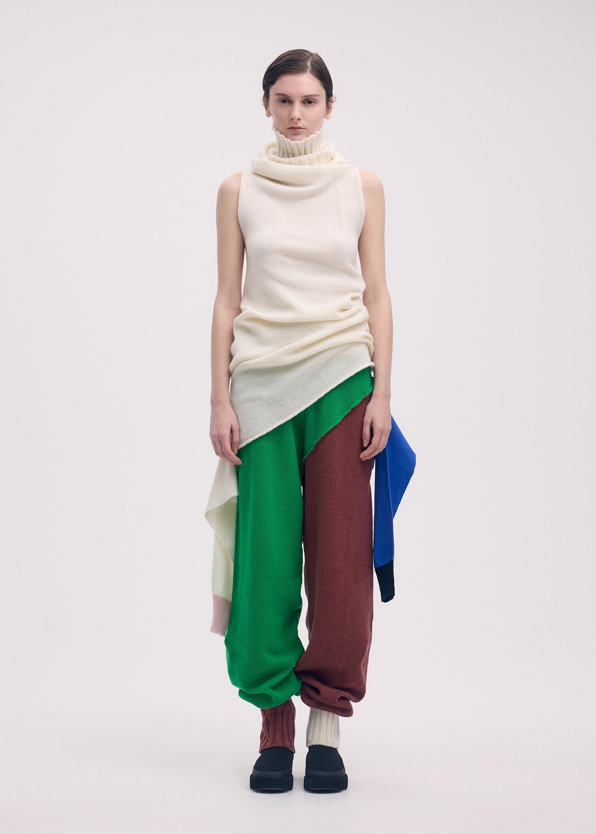 A model wears the ISSEY MIYAKE SLEEVES COLLECTION top.