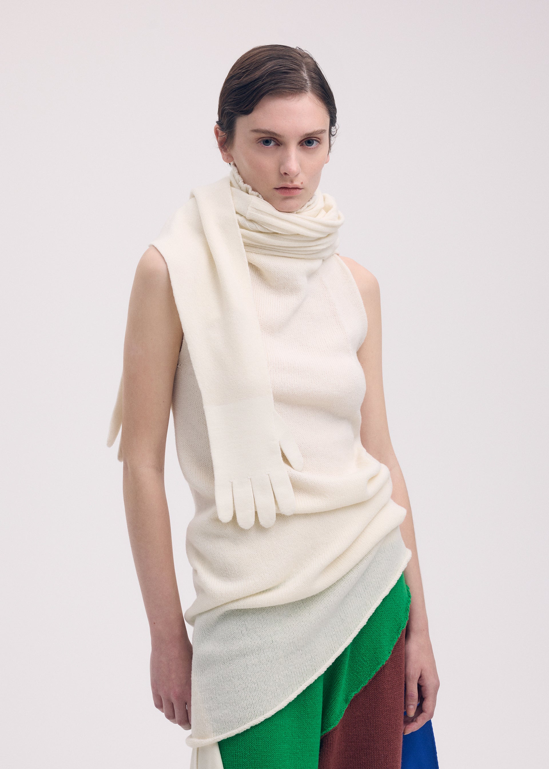A model wears the ISSEY MIYAKE SLEEVES COLLECTION top.