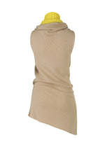 A detail shot of the ISSEY MIYAKE SLEEVES COLLECTION top.