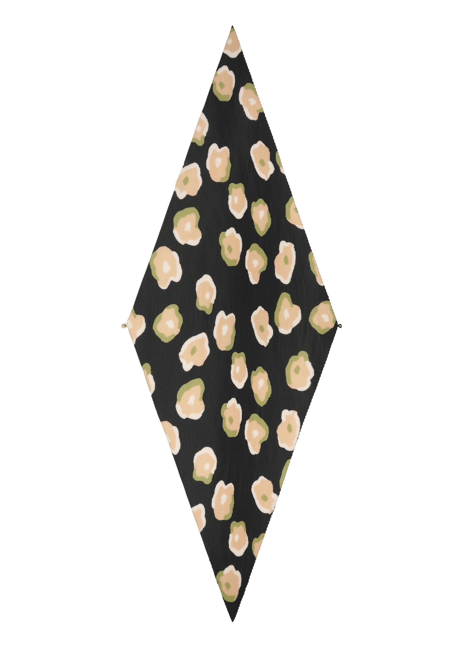 A detail shot of the ISSEY MIYAKE VERVE PLEATS STOLE stole.