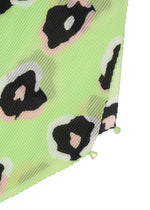 A detail shot of the ISSEY MIYAKE VERVE PLEATS STOLE stole.