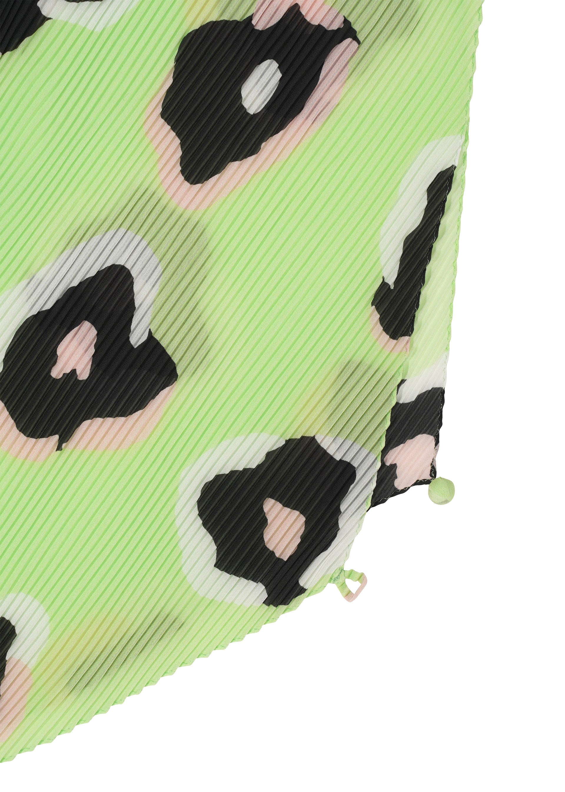 A detail shot of the ISSEY MIYAKE VERVE PLEATS STOLE stole.