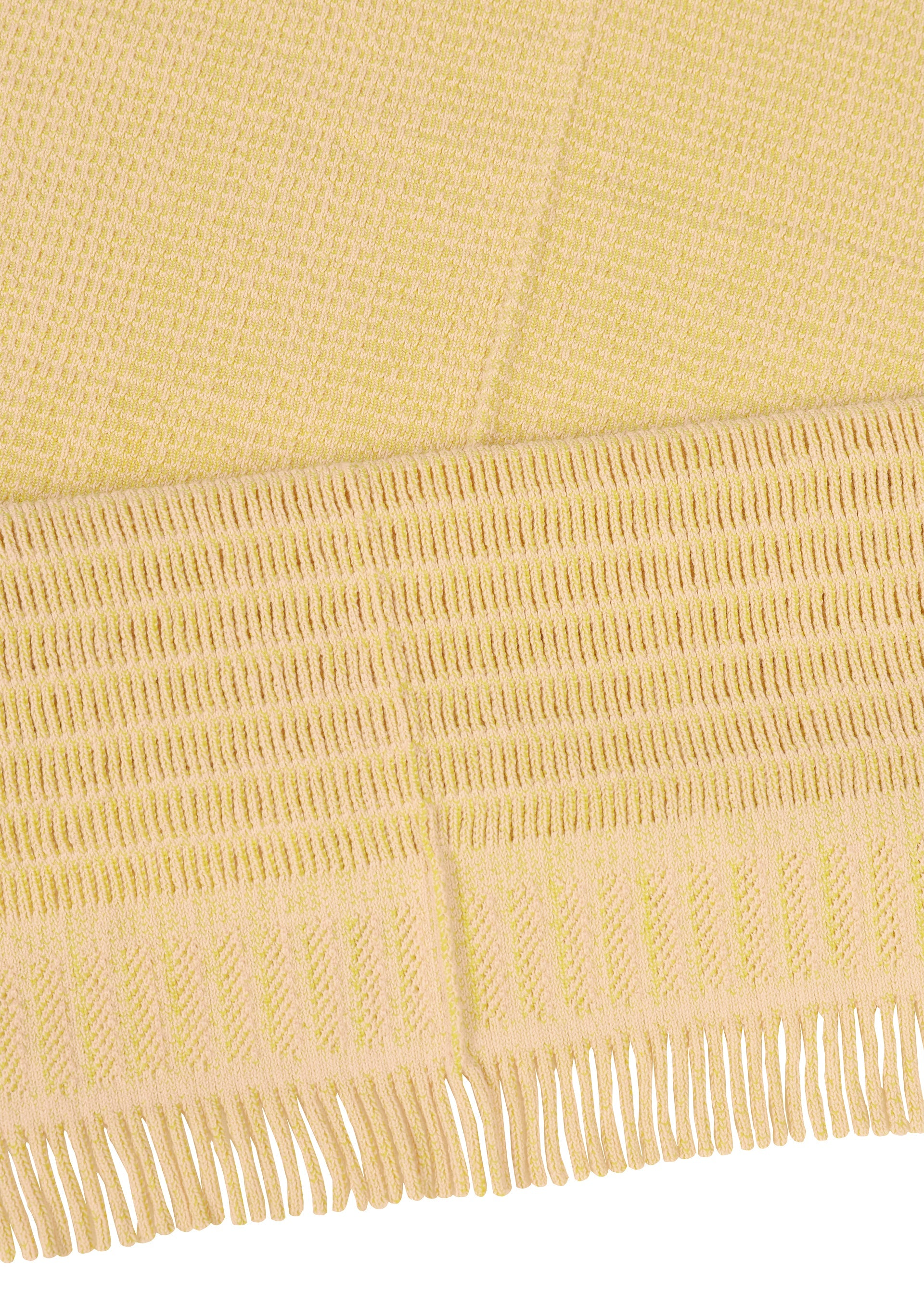 A detail shot of the ISSEY MIYAKE CROCHET AP STOLE stole.