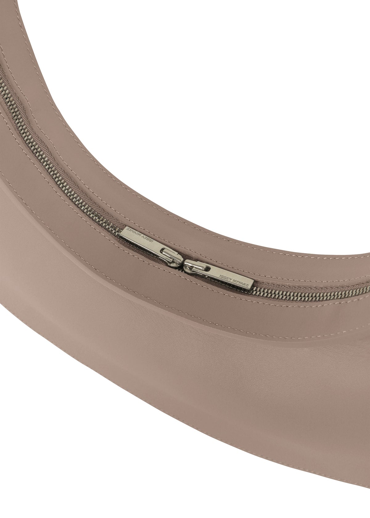 A detail shot of the ISSEY MIYAKE FIN BAG bags.