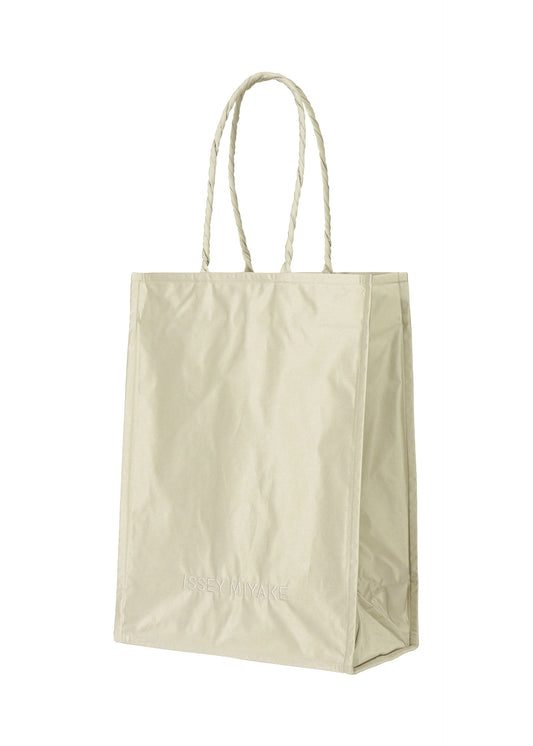 A product shot of the ISSEY MIYAKE CRUMPLABLE bag in grey (12).