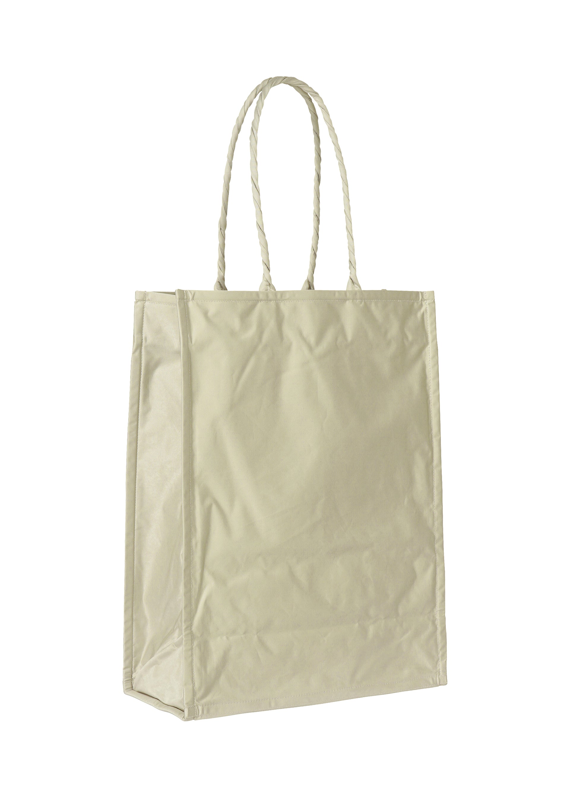 A detail shot of the ISSEY MIYAKE CRUMPLABLE bag.