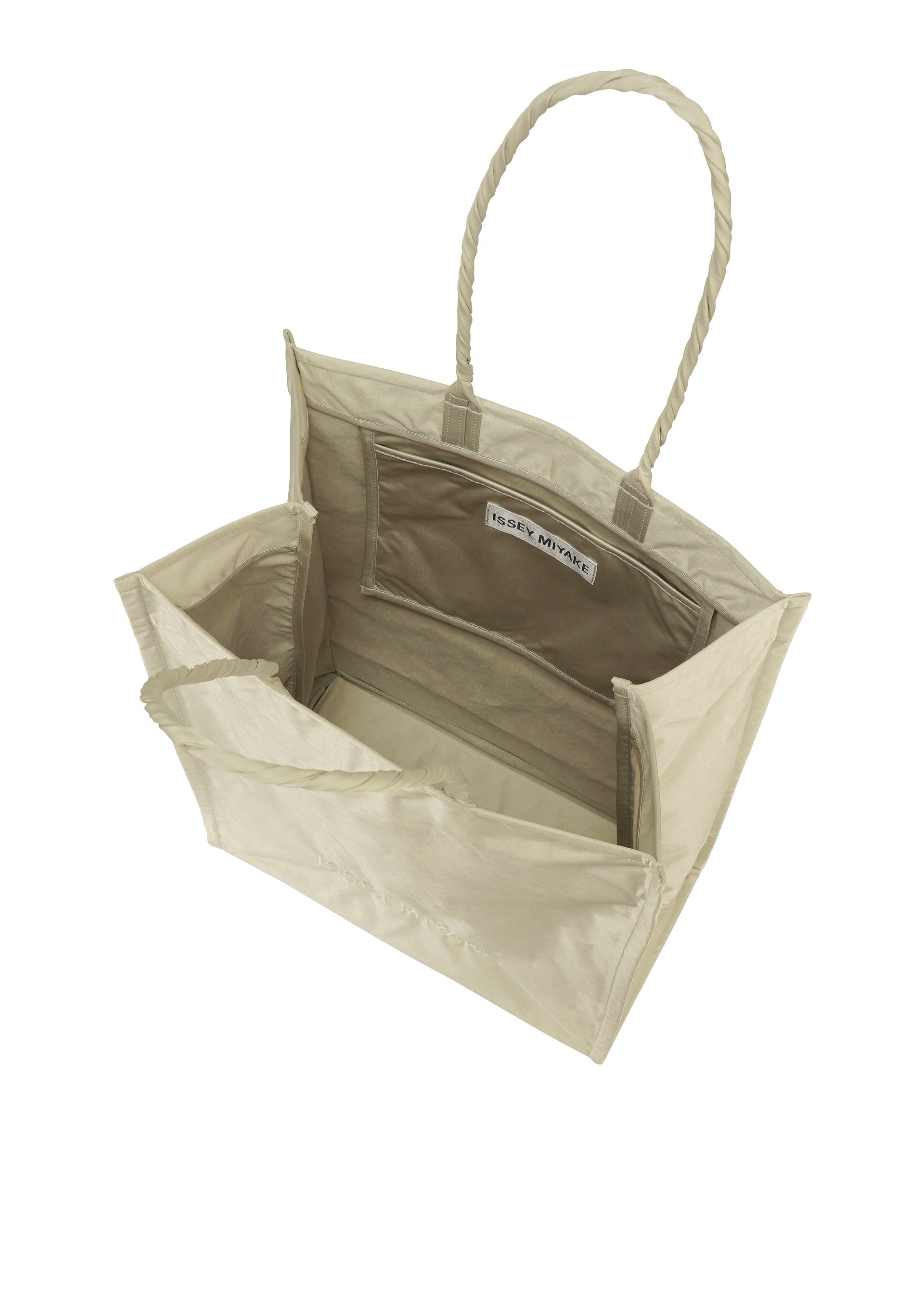 A detail shot of the ISSEY MIYAKE CRUMPLABLE bag.