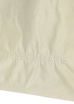 A detail shot of the ISSEY MIYAKE CRUMPLABLE bag.