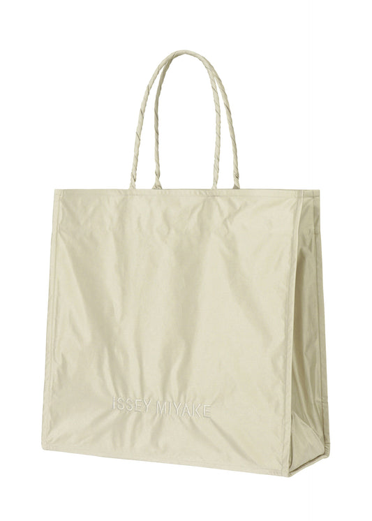 A product shot of the ISSEY MIYAKE CRUMPLABLE bag in grey (12).