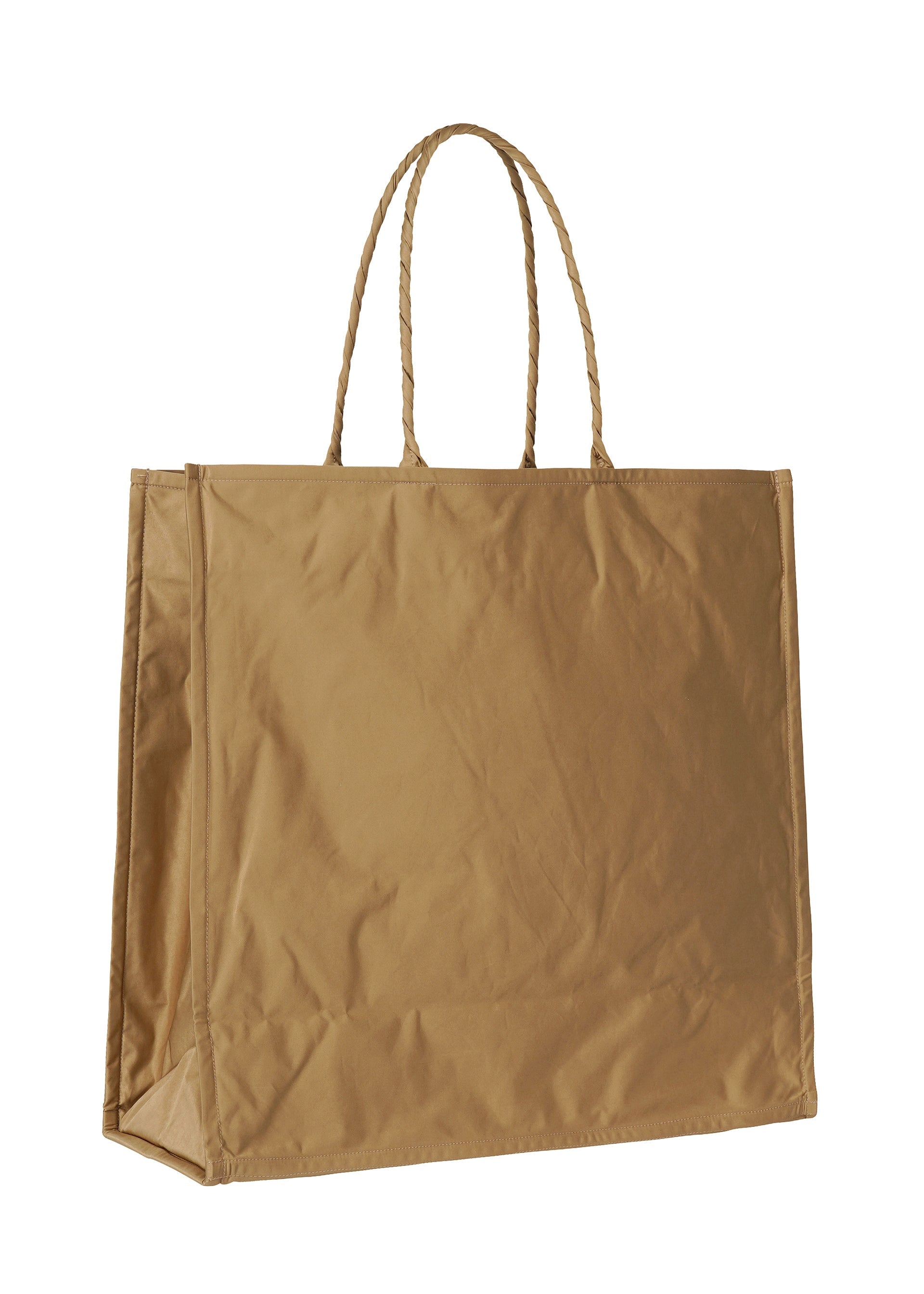 A detail shot of the ISSEY MIYAKE CRUMPLABLE bag.