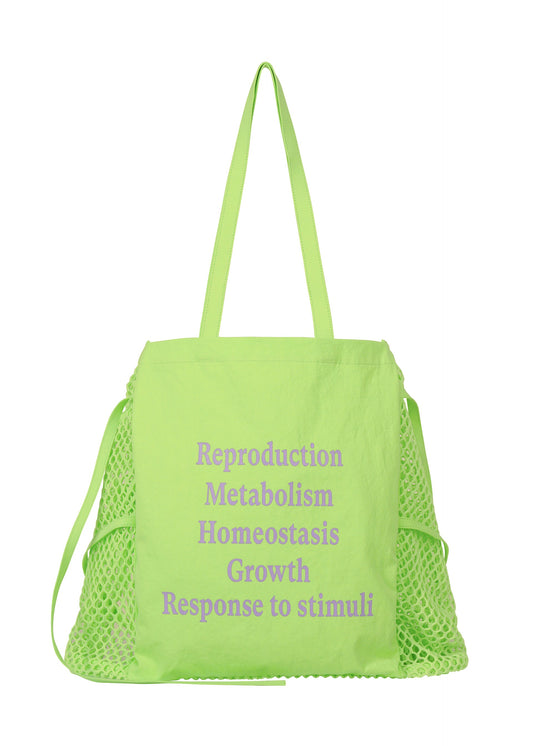 A product shot of the ISSEY MIYAKE LIVING TOTE bag in lime green (60).