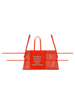 A detail shot of the ISSEY MIYAKE LIVING TOTE bag.