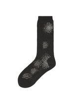 A product shot of the ISSEY MIYAKE OBSCURE SOCKS lingerie & hosiery in black-hued (17).
