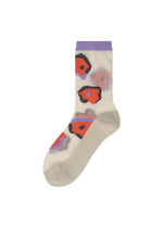 A product shot of the ISSEY MIYAKE VERVE SOCKS socks in beige-hued (46).