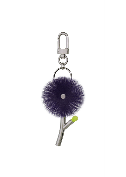 A product shot of the ISSEY MIYAKE ENGINEERED FLOWER ACC accessory in dark purple (82).
