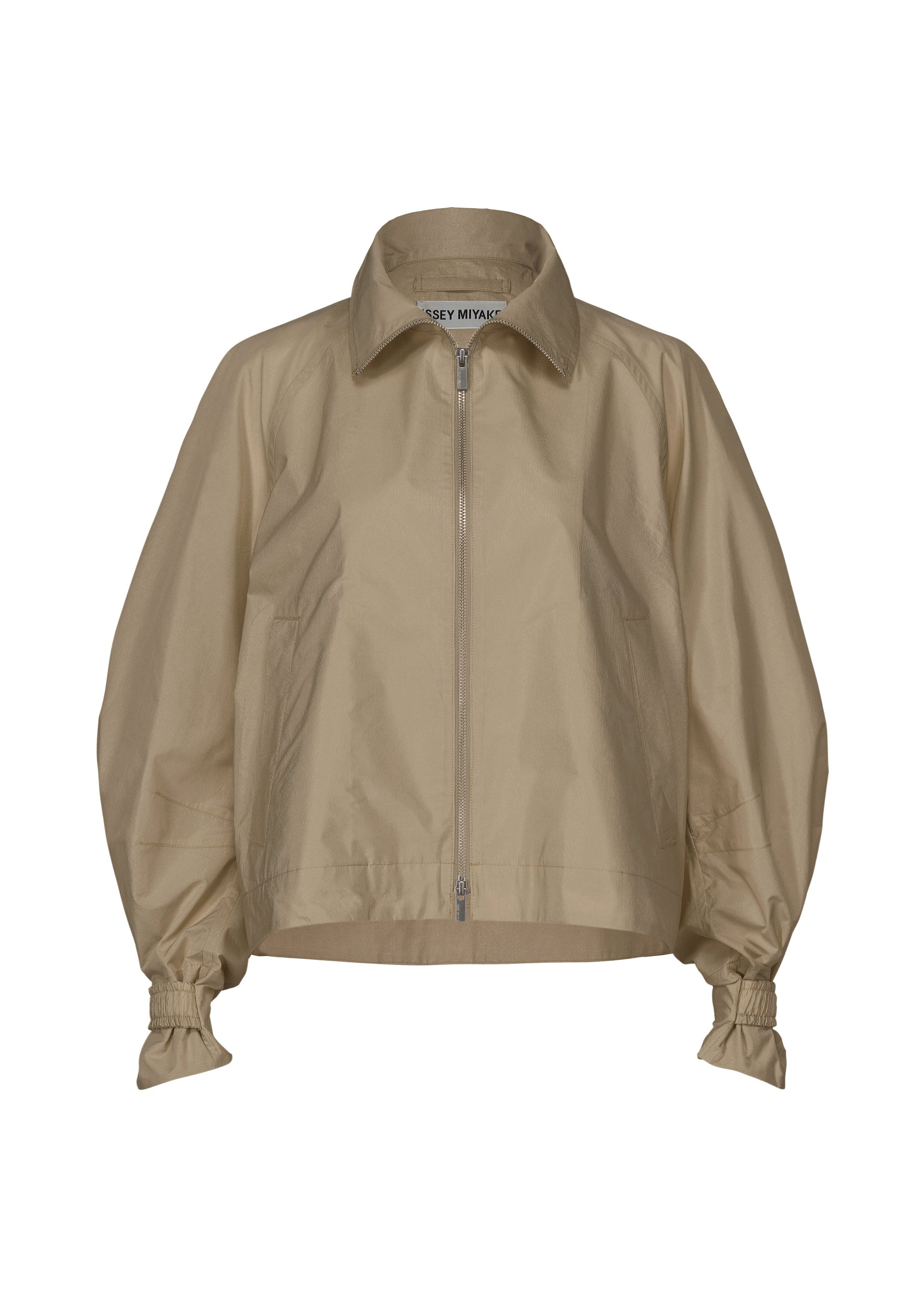 A product shot of the ISSEY MIYAKE AKIMBO clothing in greige (10).