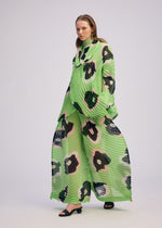 A model wears the ISSEY MIYAKE VERVE jacket.