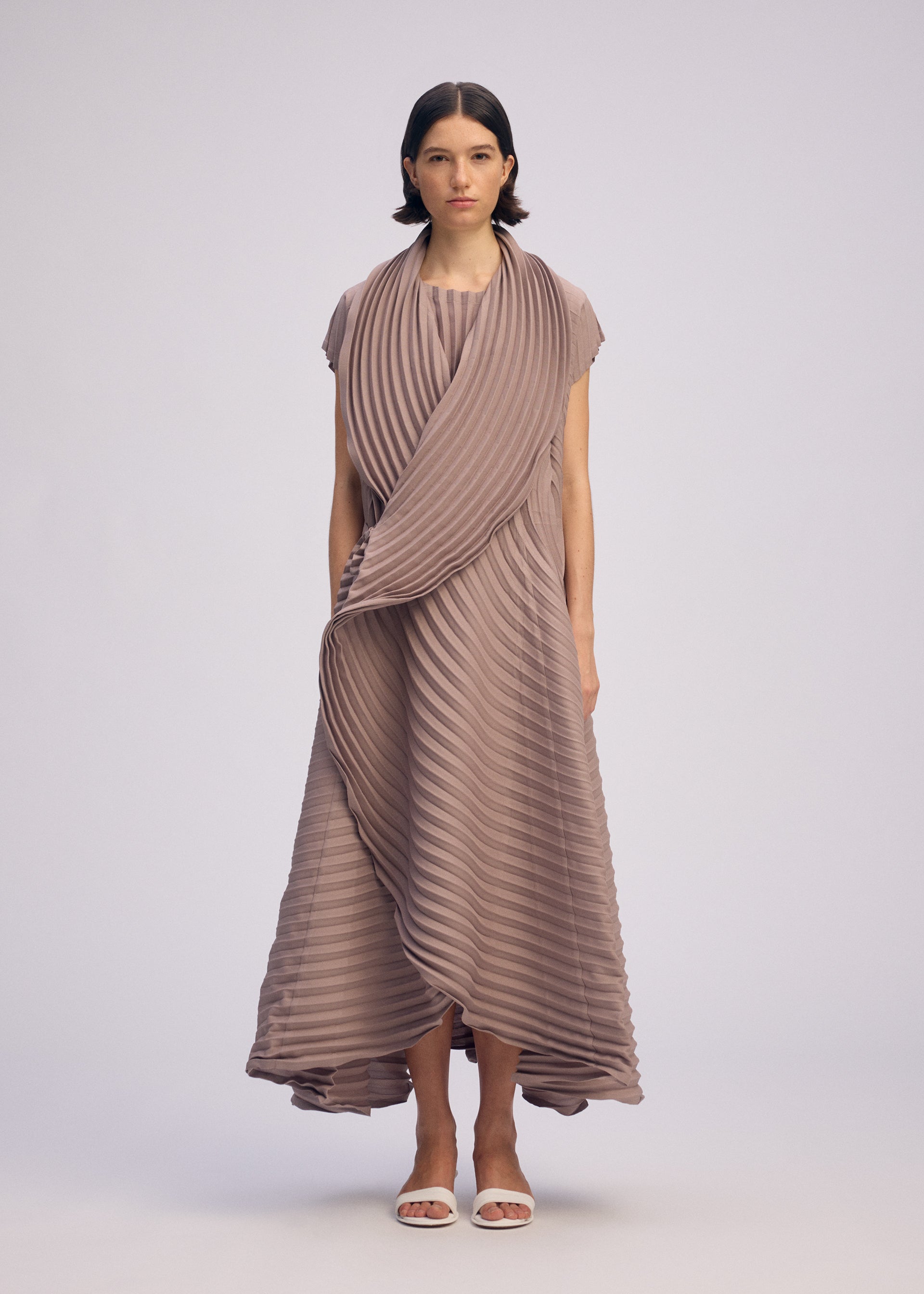 A model wears the ISSEY MIYAKE CIRCLE PLEATS PB vest.