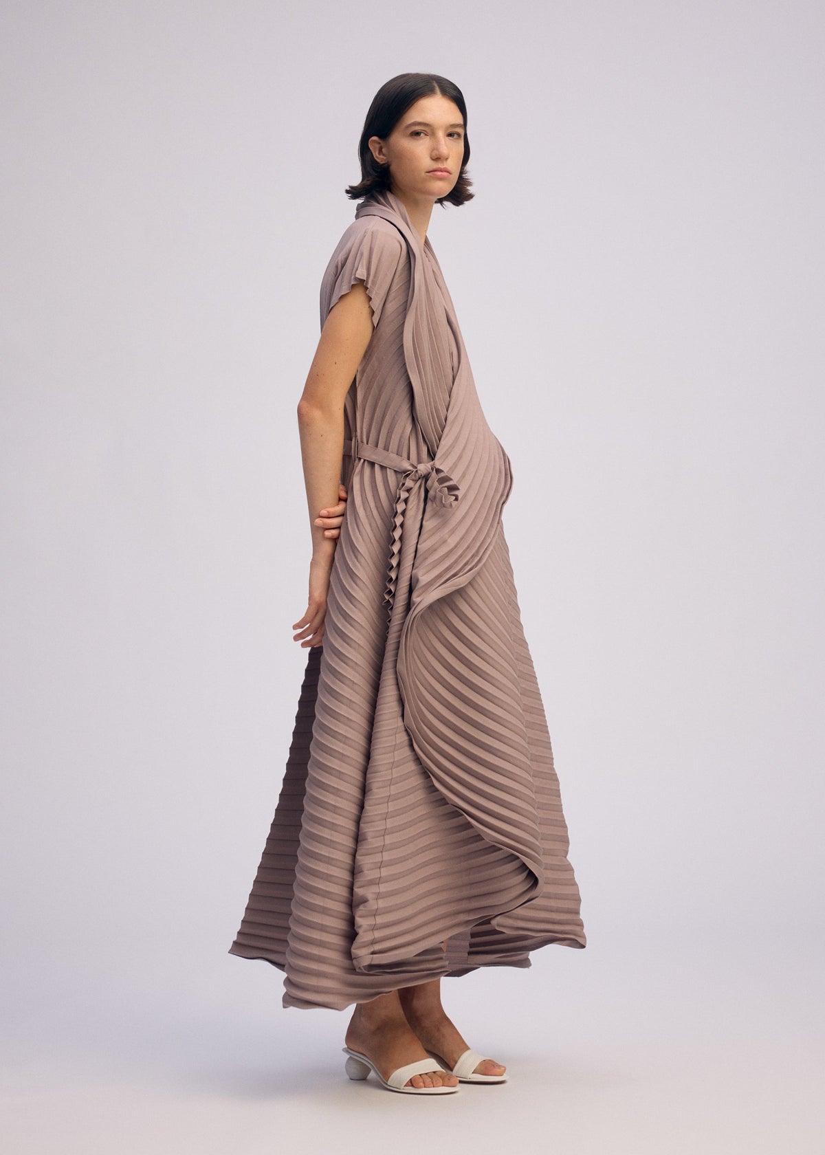 A model wears the ISSEY MIYAKE CIRCLE PLEATS PB vest.