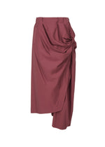 A product shot of the ISSEY MIYAKE TWISTED DRAPE trousers in burgundy (85).