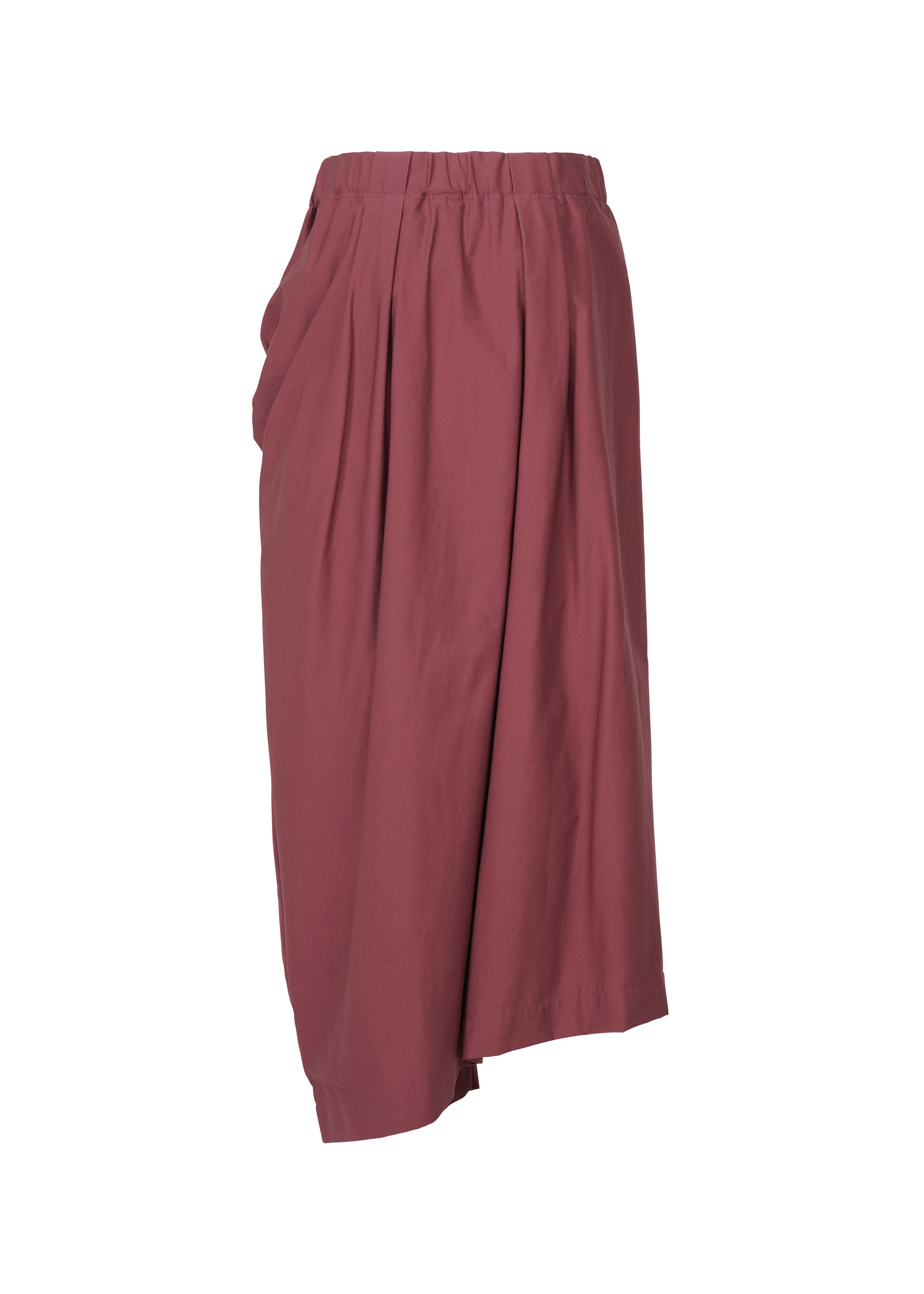 A detail shot of the ISSEY MIYAKE TWISTED DRAPE trousers.