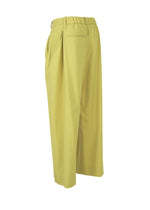 A detail shot of the ISSEY MIYAKE BELTED WOOL PANTS trousers.
