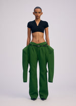 A model wears the ISSEY MIYAKE ARMS clothing.