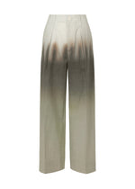A product shot of the ISSEY MIYAKE PLUMAGE trousers in chukar.