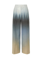 A product shot of the ISSEY MIYAKE PLUMAGE trousers in starling.