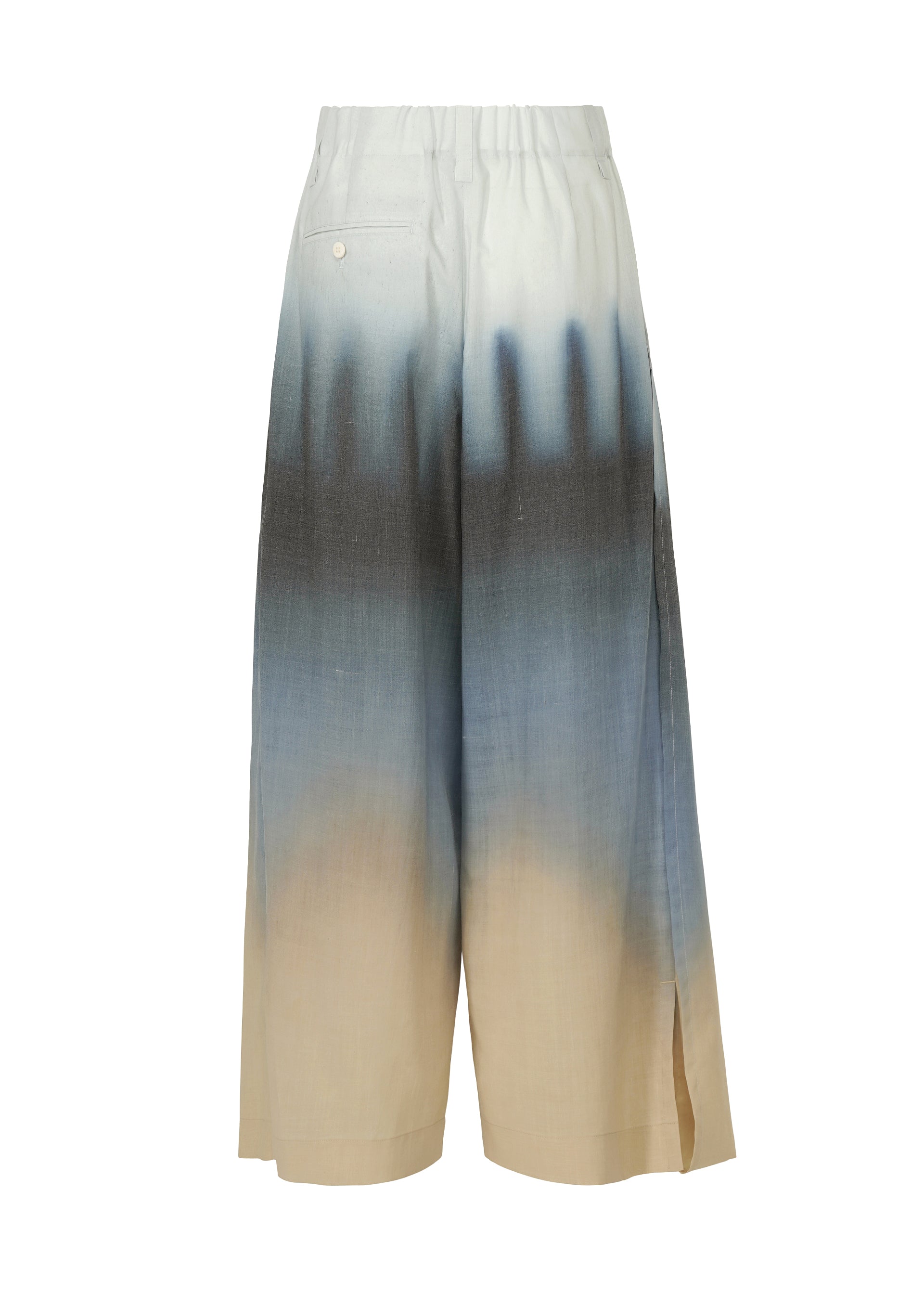 A detail shot of the ISSEY MIYAKE PLUMAGE trousers.
