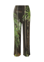 A product shot of the ISSEY MIYAKE URBAN JUNGLE PLEATS trousers in black-hued (17).