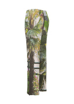 A detail shot of the ISSEY MIYAKE URBAN JUNGLE PLEATS trousers.
