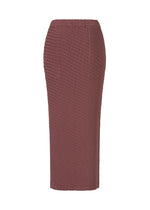 A detail shot of the ISSEY MIYAKE SLEEK PLEATS skirt.