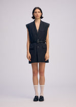 A model wears the ISSEY MIYAKE PALINDROME jumpsuit.