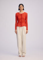 A model wears the ISSEY MIYAKE CHIFFON TWIST 2 shirt.