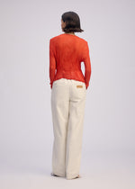 A model wears the ISSEY MIYAKE CHIFFON TWIST 2 shirt.