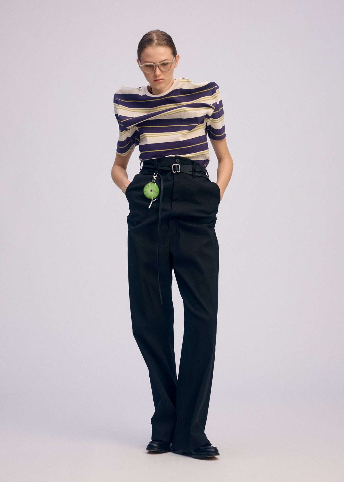 A model wears the ISSEY MIYAKE GENERIC WEAR STRIPES shirt.