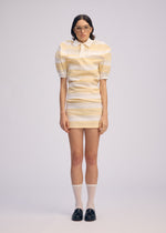 A model wears the ISSEY MIYAKE GENERIC WEAR STRIPES shirt.